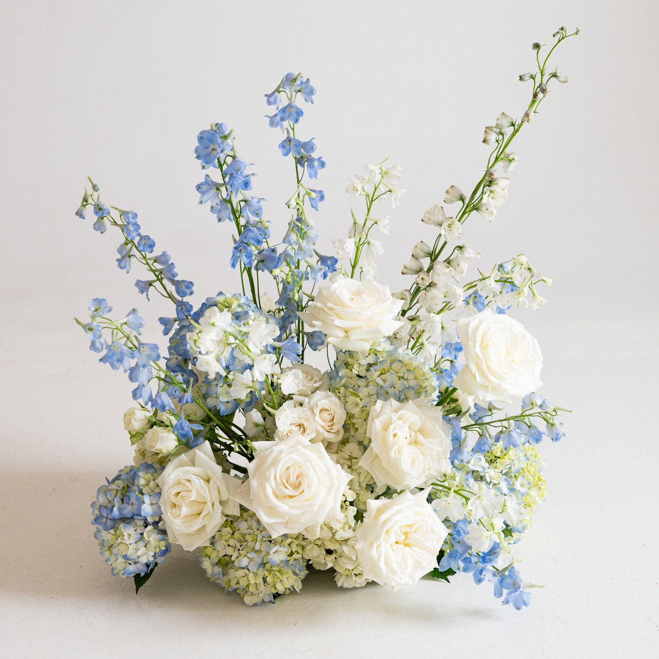 Coastal Hydrangea Grounded Ceremony Arrangement