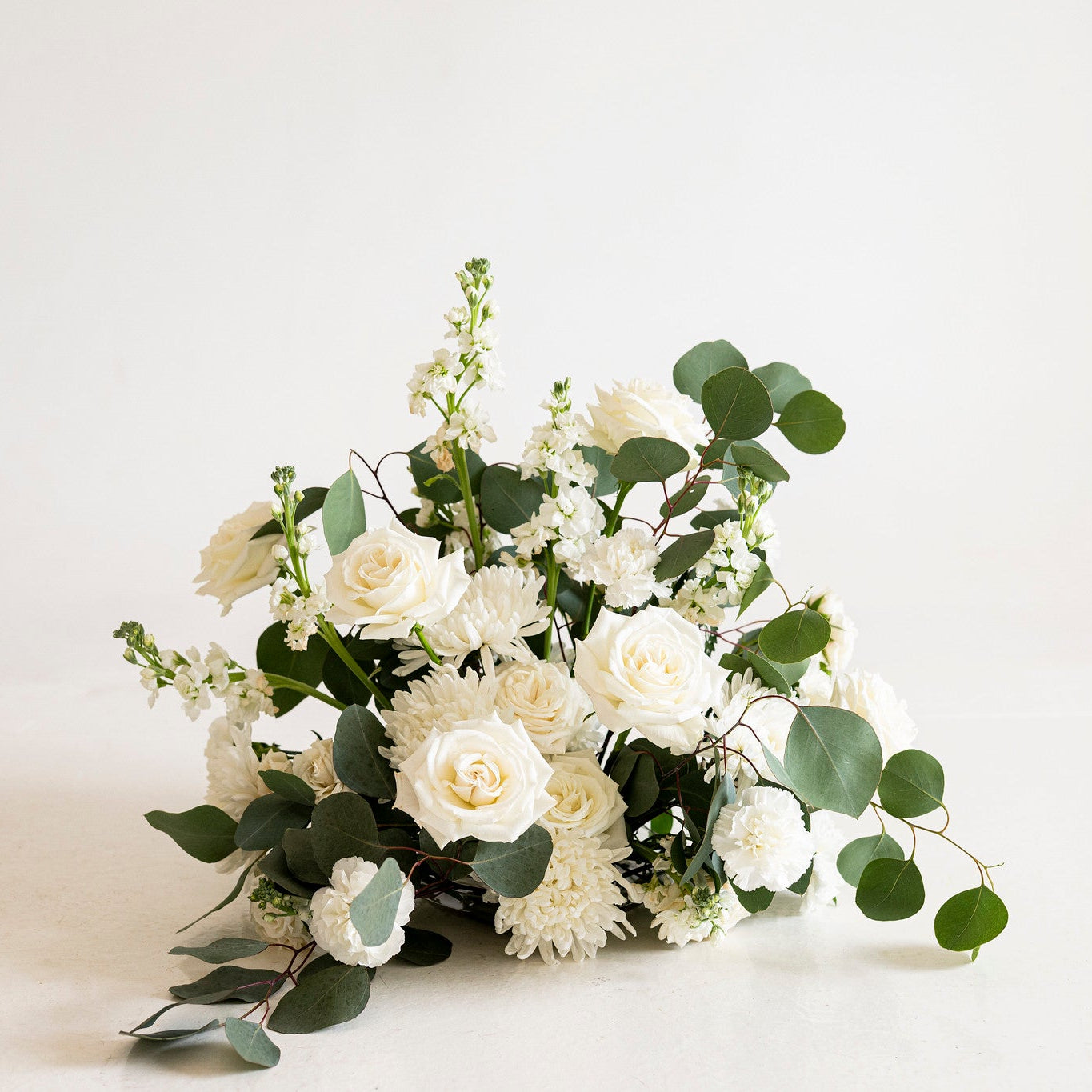 Cream and Sage Grounded Ceremony Arrangement