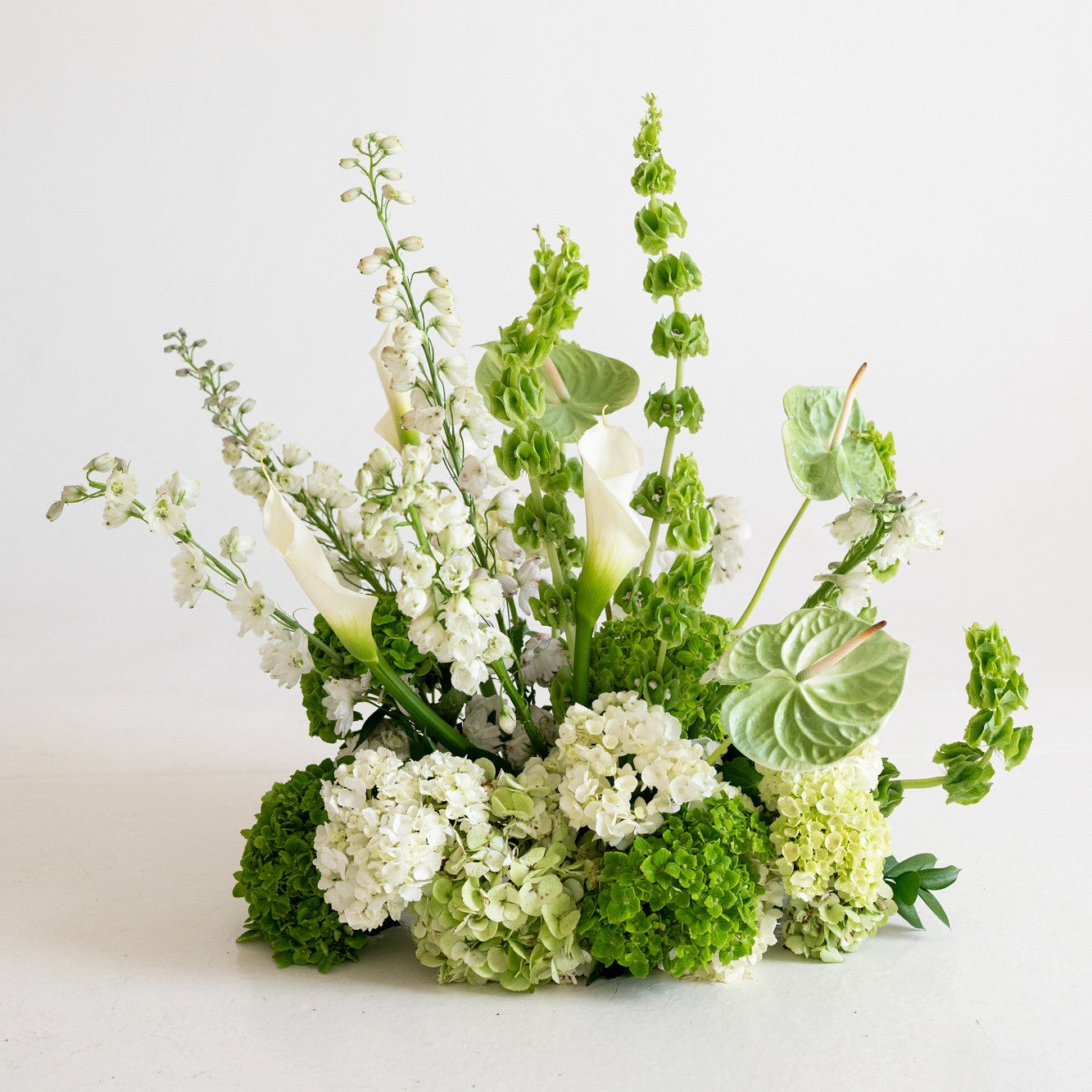 Modern Hydrangea Grounded Ceremony Arrangement