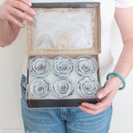 gray preserved roses