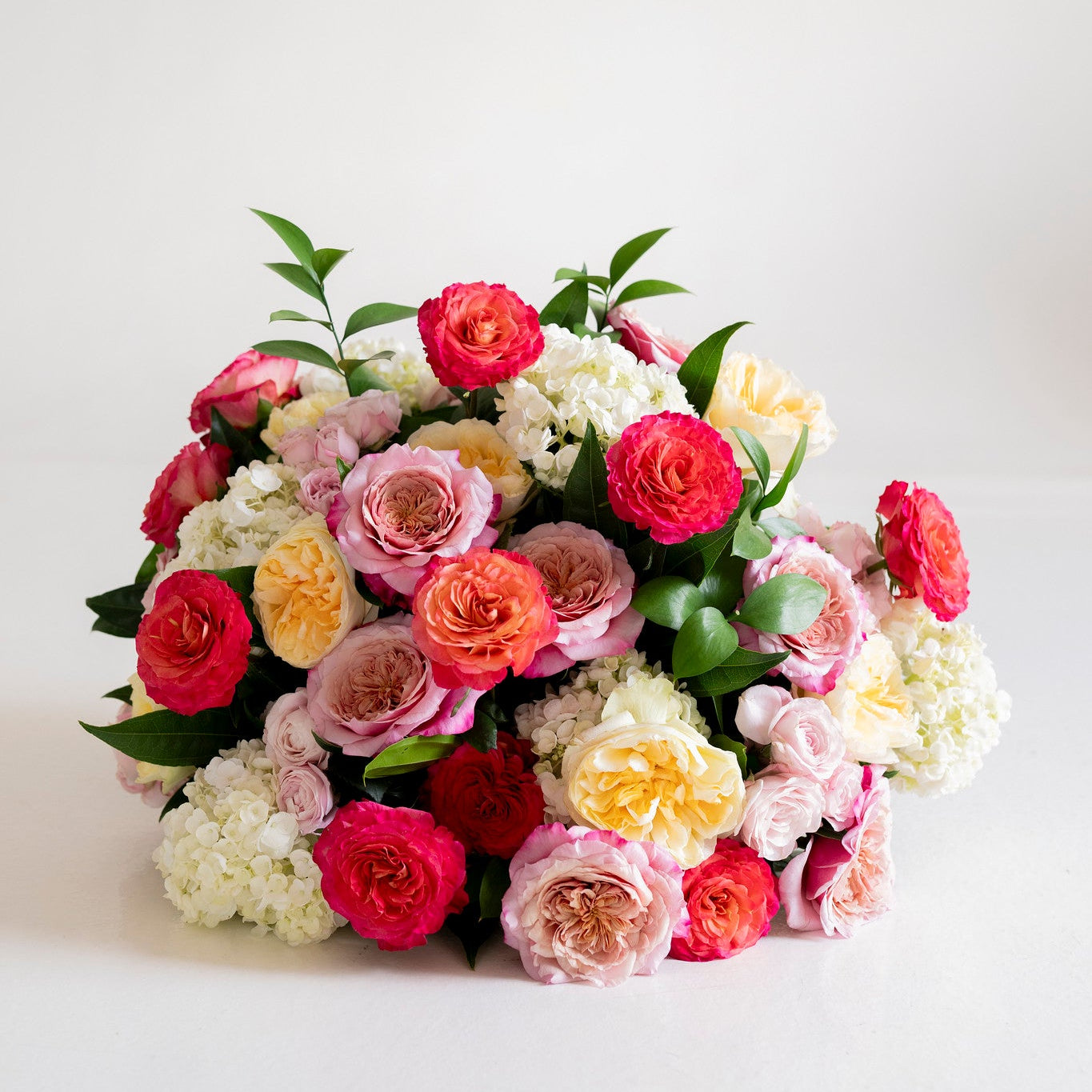Sunset Garden Rose Grounded Ceremony Arrangement