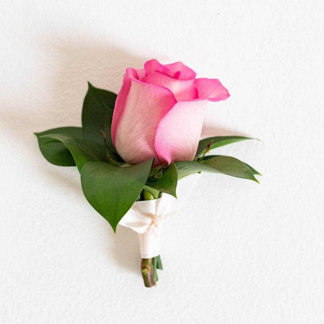 pink boutonniere for formals and prom