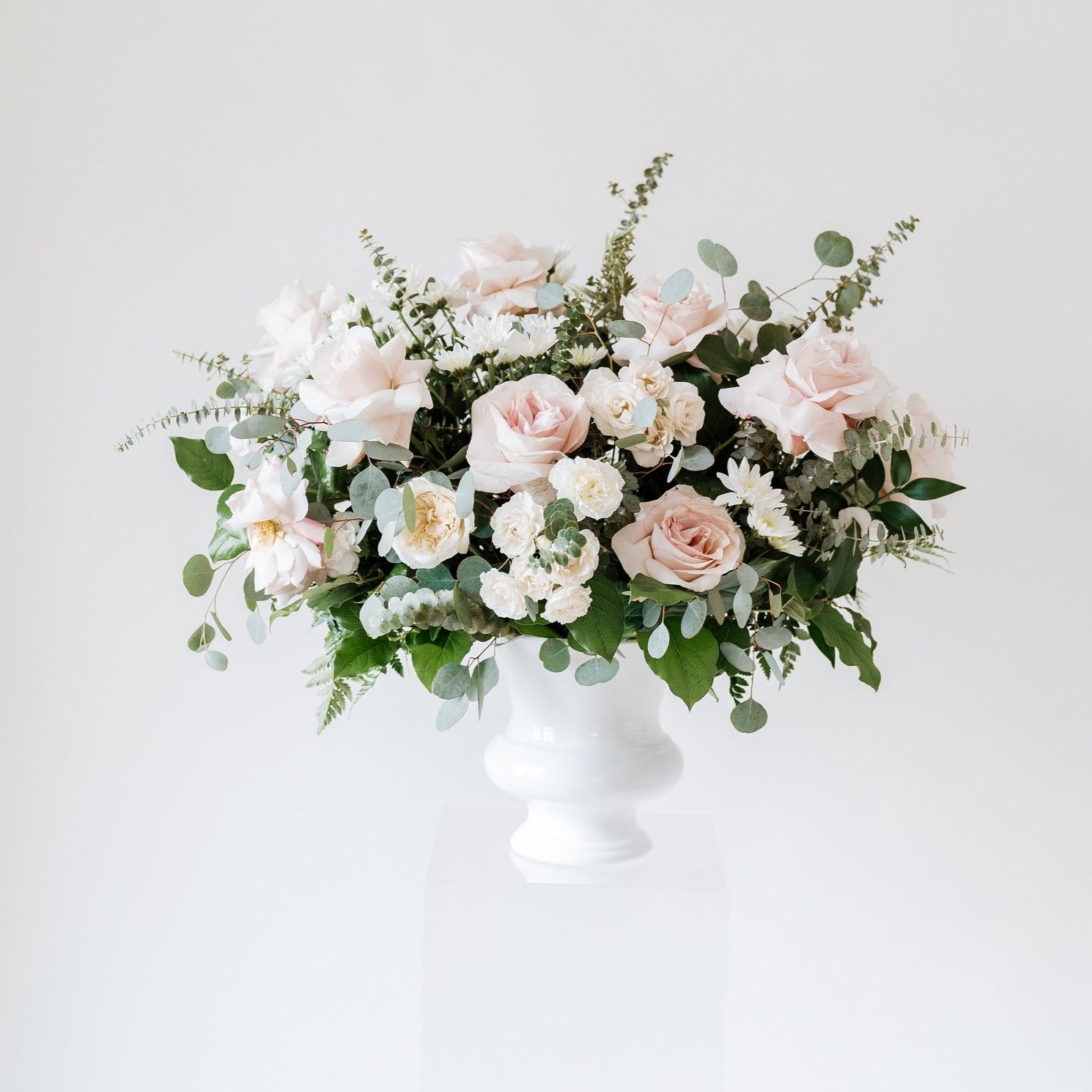 Dusty Rose and Cream Ceremony Wedding Flowers with Quicksand Roses by Flower Moxie
